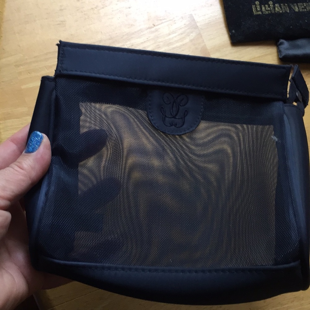 Guerlain cosmetic bag 6,5x5x1,75”
